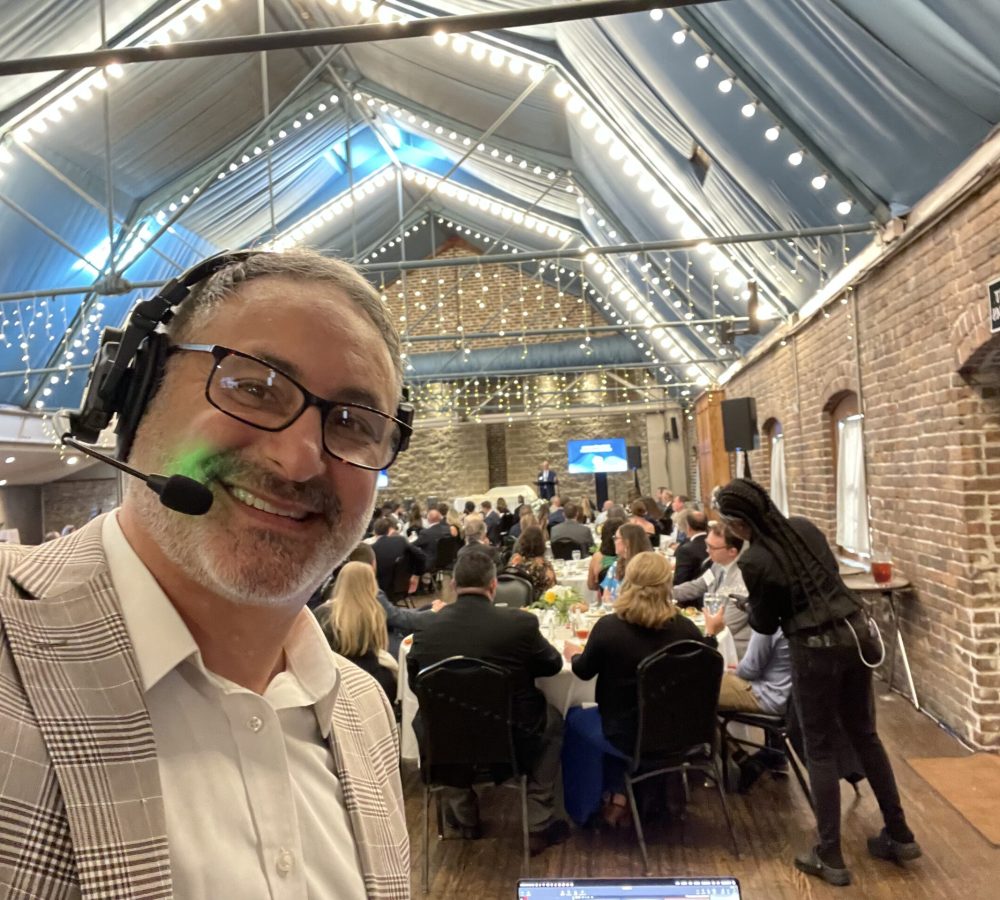 Founder Joe Perrock takes a selfie at a formal event.