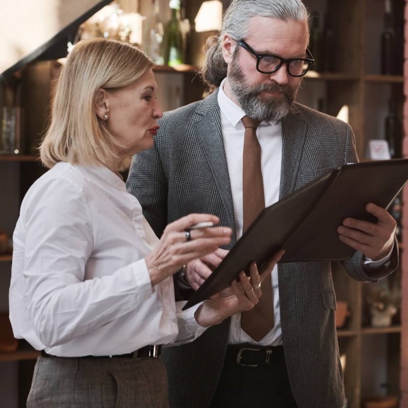 Business couple organizing the event